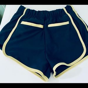 Navy blue, yellow striped short